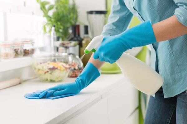 woman cleaning counters