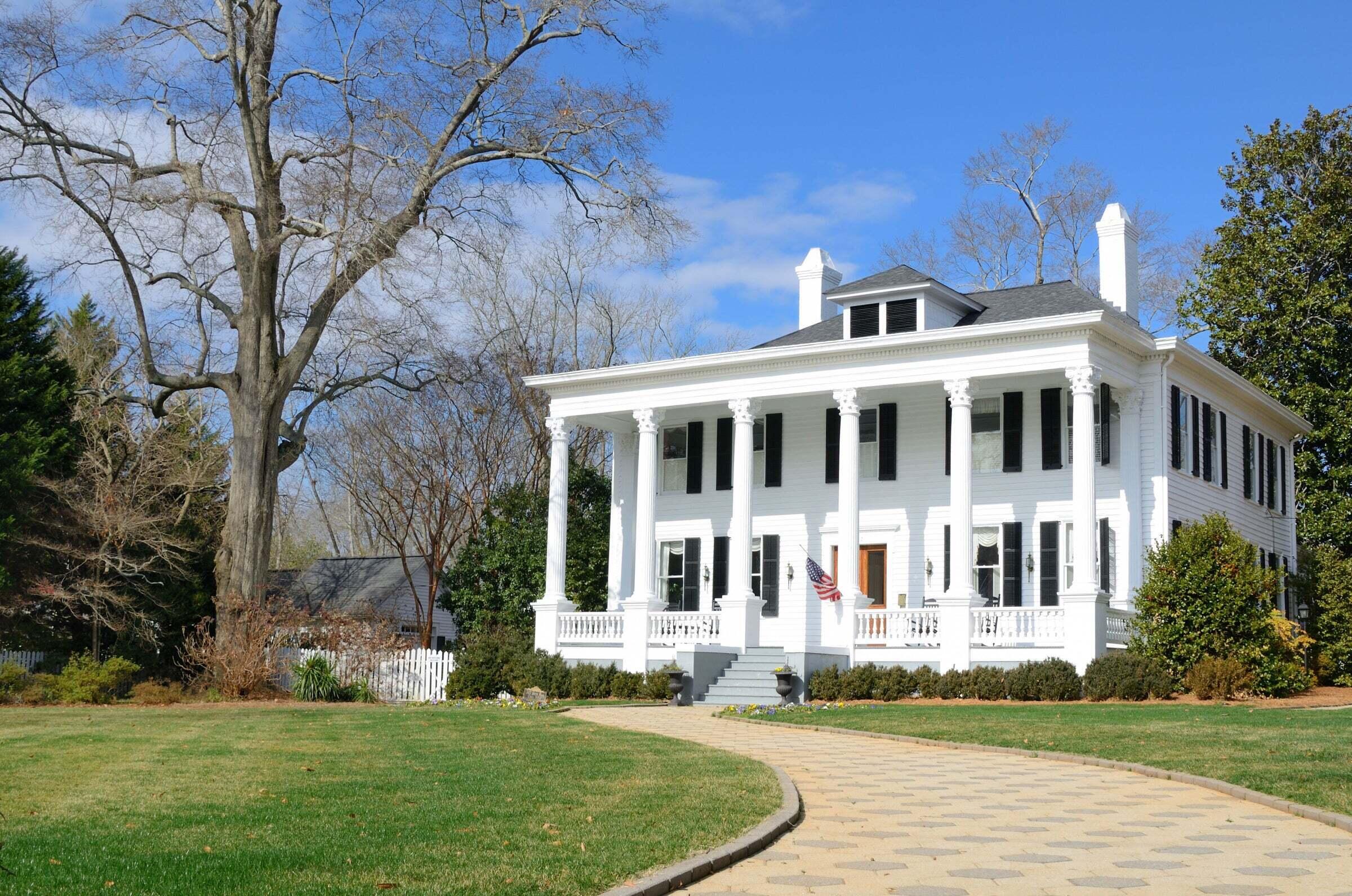 historic white house home on land