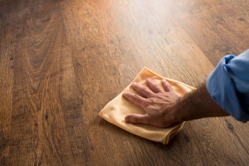 cleaning-wood-floor-with-a-soft-rag.jpg