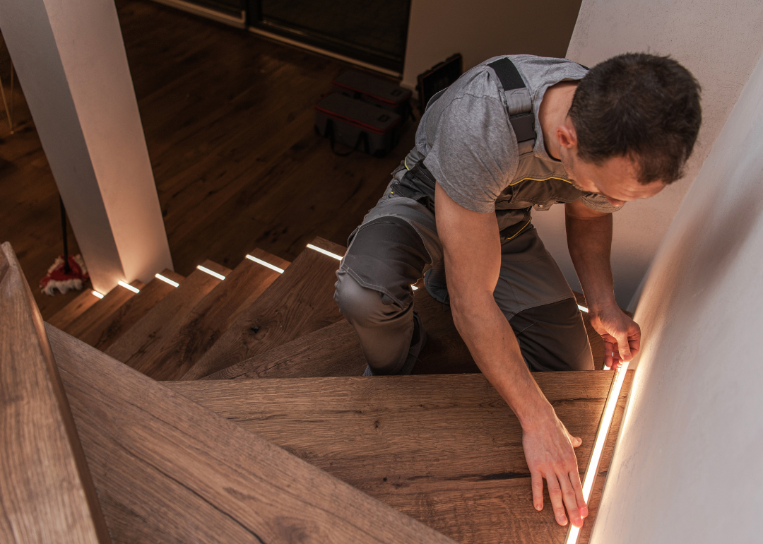 Man remodels stairs in home