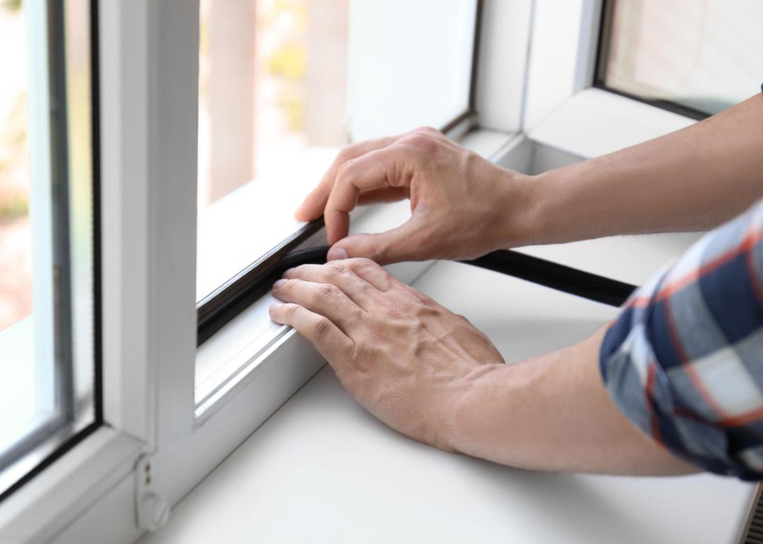 Homeowner seals window